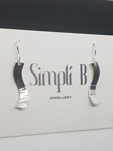 Sterling silver S shaped half hammer textured curved drop earrings